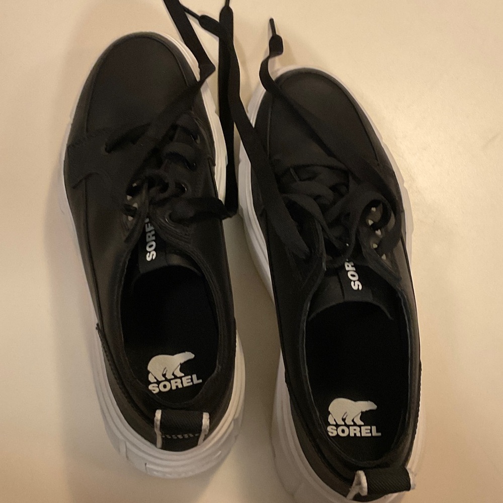 Sorel Women’s Black and White waterproof Sneakers, never worn